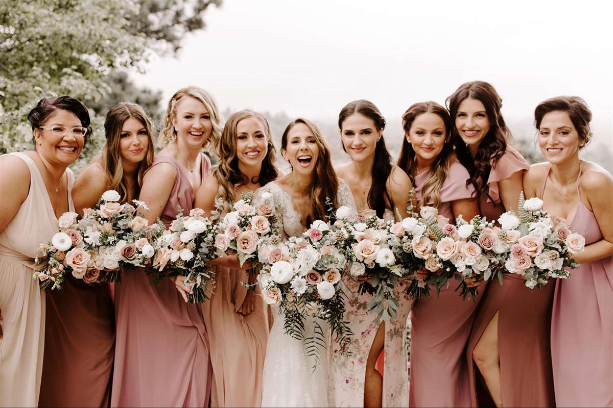 Dessy Real Wedding - Mix and Match Pink Bridesmaids - @theshepardsphoto